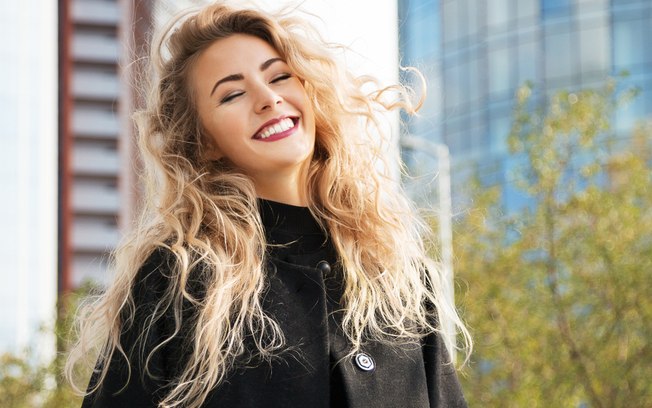 smiling woman with blond hair