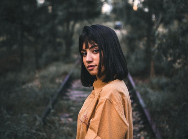 Straight-haired woman with blunt cut and fringe