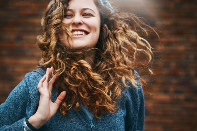 Curly hair with a blonde tone 