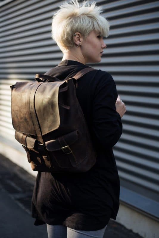 Short blonde hair the model comes out in the photo to highlight her innovative haircut