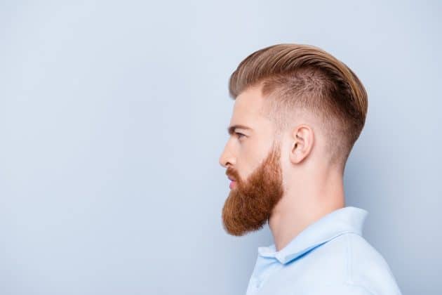 man with shaved haircut on the sides and short length at the top