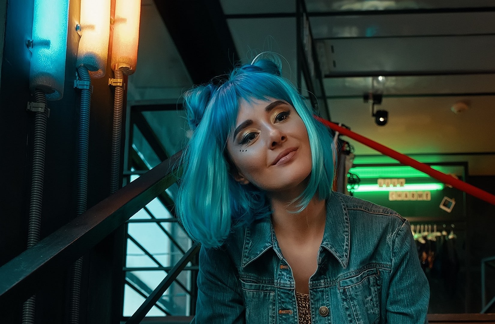 Urban lifestyle model showing her straight blue hair to shoulder