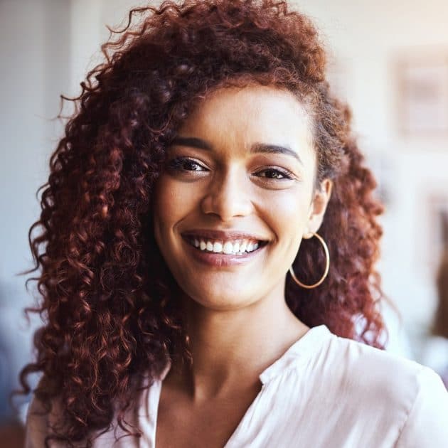 Curly hair split at the side